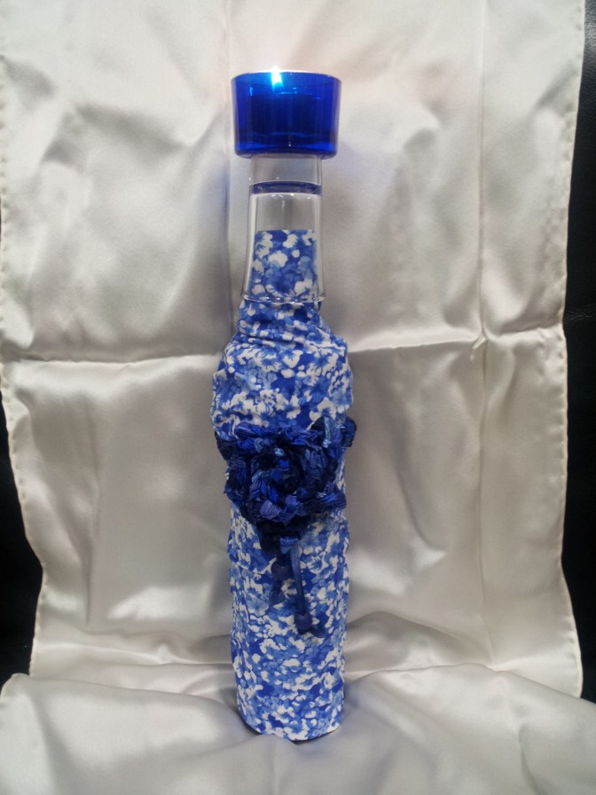Decorated bottle candle